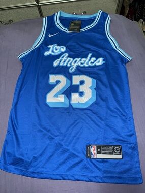 Nike Blue Basketball Jersey with Light Blue and White Trim